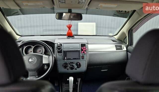 Синий Ниссан Тиида, объемом двигателя 1.6 л и пробегом 209 тыс. км за 5800 $, фото 14 на Automoto.ua