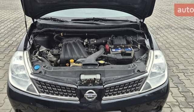 Синий Ниссан Тиида, объемом двигателя 1.6 л и пробегом 209 тыс. км за 5800 $, фото 10 на Automoto.ua