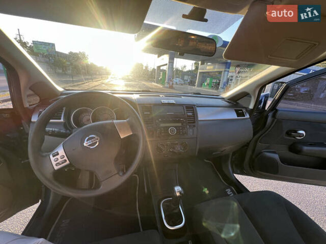 Синий Ниссан Тиида, объемом двигателя 1.6 л и пробегом 88 тыс. км за 5200 $, фото 18 на Automoto.ua