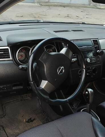 Синій Ніссан Тііда, об'ємом двигуна 1.6 л та пробігом 107 тис. км за 5850 $, фото 5 на Automoto.ua