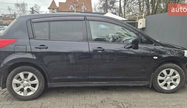 Синий Ниссан Тиида, объемом двигателя 1.6 л и пробегом 209 тыс. км за 5800 $, фото 24 на Automoto.ua