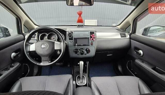 Синий Ниссан Тиида, объемом двигателя 1.6 л и пробегом 209 тыс. км за 5800 $, фото 12 на Automoto.ua