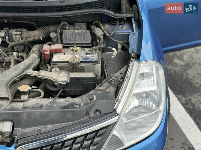 Синий Ниссан Тиида, объемом двигателя 1.6 л и пробегом 172 тыс. км за 6200 $, фото 23 на Automoto.ua