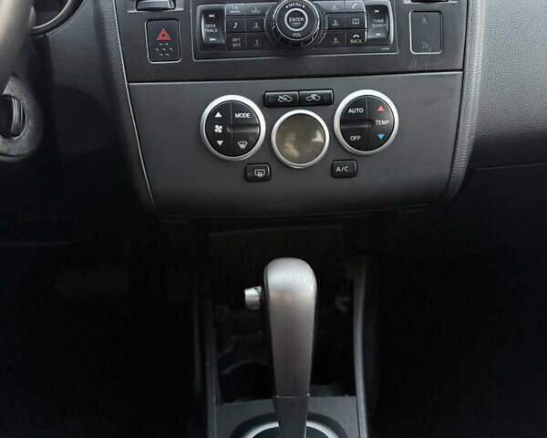 Синий Ниссан Тиида, объемом двигателя 1.6 л и пробегом 210 тыс. км за 6300 $, фото 14 на Automoto.ua