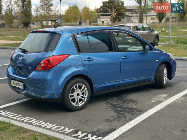Синий Ниссан Тиида, объемом двигателя 1.6 л и пробегом 172 тыс. км за 6200 $, фото 7 на Automoto.ua