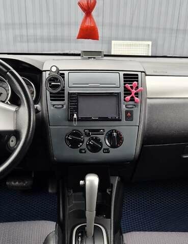 Синий Ниссан Тиида, объемом двигателя 1.6 л и пробегом 209 тыс. км за 5800 $, фото 15 на Automoto.ua