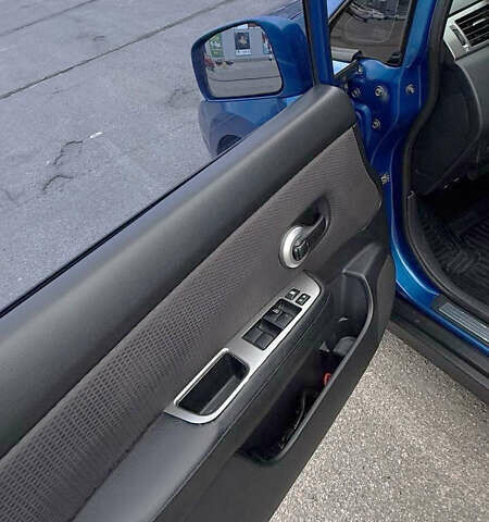 Синий Ниссан Тиида, объемом двигателя 1.6 л и пробегом 243 тыс. км за 5800 $, фото 9 на Automoto.ua