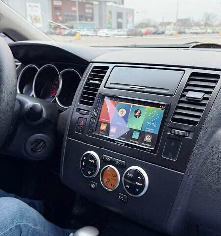 Синий Ниссан Тиида, объемом двигателя 1.6 л и пробегом 243 тыс. км за 5800 $, фото 13 на Automoto.ua