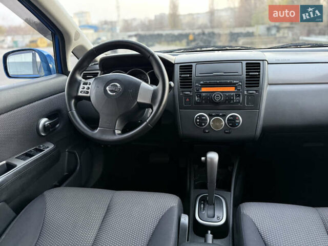 Синий Ниссан Тиида, объемом двигателя 1.6 л и пробегом 210 тыс. км за 6300 $, фото 12 на Automoto.ua