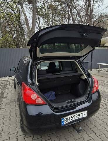 Синий Ниссан Тиида, объемом двигателя 1.6 л и пробегом 209 тыс. км за 5800 $, фото 4 на Automoto.ua