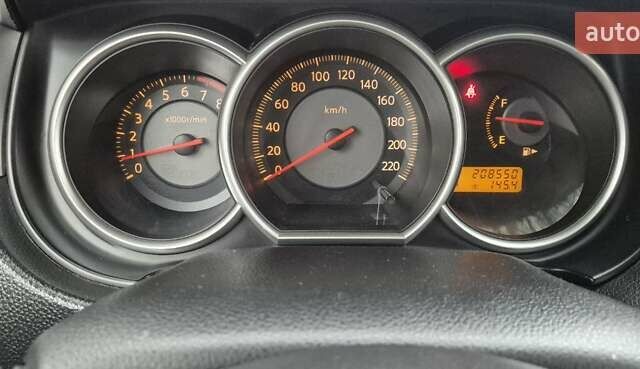 Синий Ниссан Тиида, объемом двигателя 1.6 л и пробегом 209 тыс. км за 5800 $, фото 8 на Automoto.ua