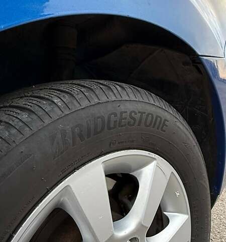 Синий Ниссан Тиида, объемом двигателя 1.6 л и пробегом 243 тыс. км за 5800 $, фото 7 на Automoto.ua