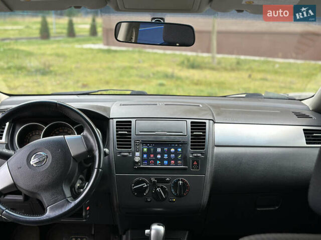 Синий Ниссан Тиида, объемом двигателя 1.6 л и пробегом 172 тыс. км за 6200 $, фото 17 на Automoto.ua