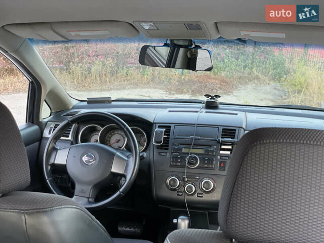 Синий Ниссан Тиида, объемом двигателя 1.6 л и пробегом 161 тыс. км за 8200 $, фото 19 на Automoto.ua