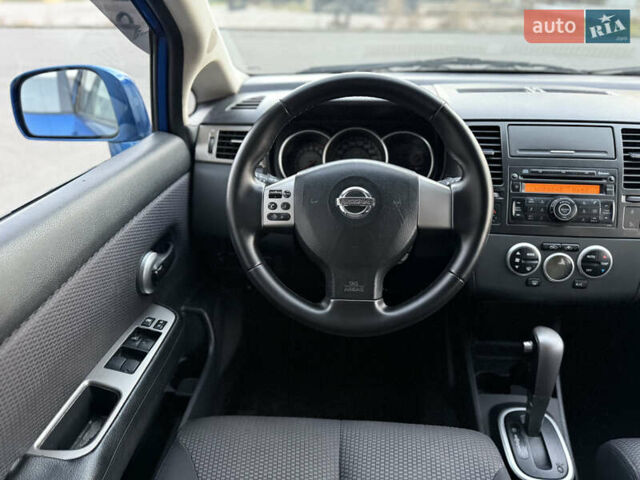 Синий Ниссан Тиида, объемом двигателя 1.6 л и пробегом 210 тыс. км за 6300 $, фото 13 на Automoto.ua