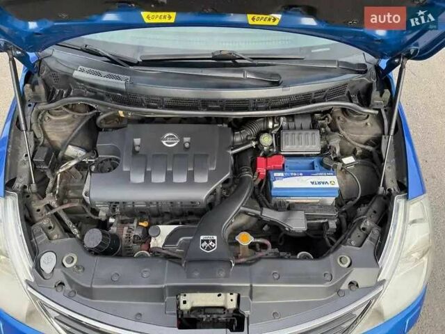 Синий Ниссан Тиида, объемом двигателя 1.6 л и пробегом 290 тыс. км за 5555 $, фото 7 на Automoto.ua