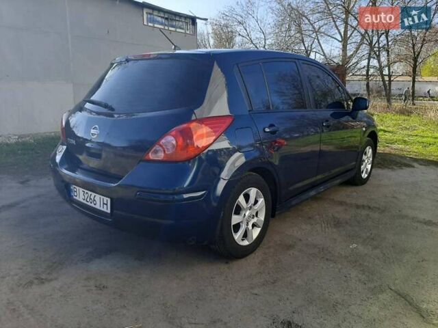 Синий Ниссан Тиида, объемом двигателя 1.6 л и пробегом 187 тыс. км за 7300 $, фото 4 на Automoto.ua