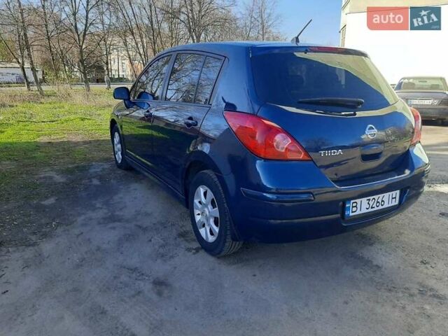 Синий Ниссан Тиида, объемом двигателя 1.6 л и пробегом 187 тыс. км за 7300 $, фото 3 на Automoto.ua