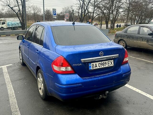 Синий Ниссан Тиида, объемом двигателя 1.6 л и пробегом 209 тыс. км за 5700 $, фото 2 на Automoto.ua