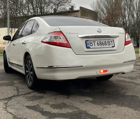 Белый Ниссан Теана, объемом двигателя 2.5 л и пробегом 239 тыс. км за 7700 $, фото 3 на Automoto.ua