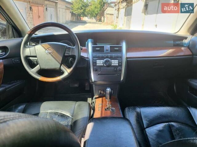 Белый Ниссан Теана, объемом двигателя 3.5 л и пробегом 272 тыс. км за 5800 $, фото 1 на Automoto.ua