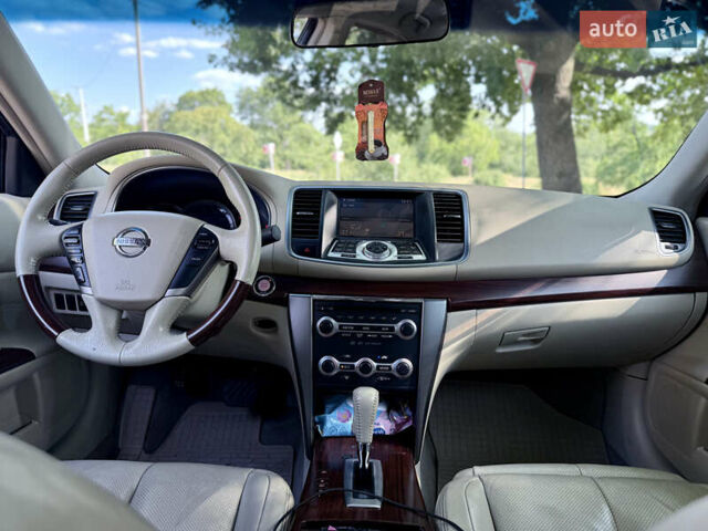 Белый Ниссан Теана, объемом двигателя 3.5 л и пробегом 225 тыс. км за 5650 $, фото 43 на Automoto.ua