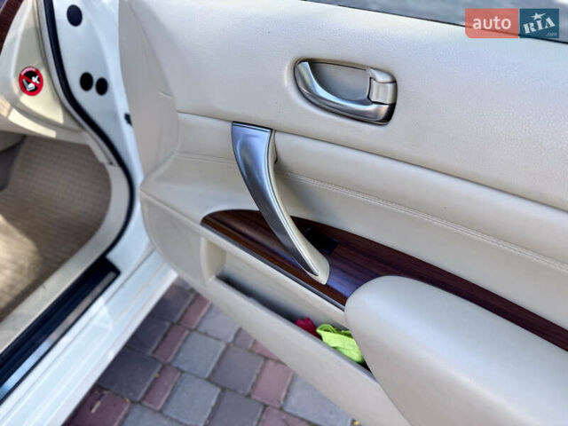 Белый Ниссан Теана, объемом двигателя 3.5 л и пробегом 225 тыс. км за 5650 $, фото 21 на Automoto.ua