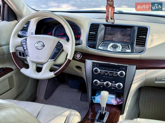 Белый Ниссан Теана, объемом двигателя 3.5 л и пробегом 225 тыс. км за 5650 $, фото 41 на Automoto.ua