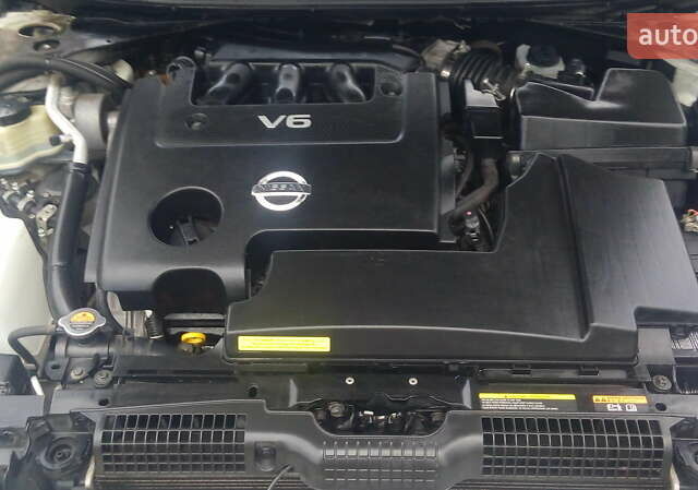 Белый Ниссан Теана, объемом двигателя 3.5 л и пробегом 112 тыс. км за 11200 $, фото 20 на Automoto.ua