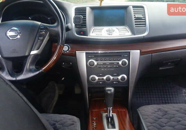 Белый Ниссан Теана, объемом двигателя 3.5 л и пробегом 112 тыс. км за 11200 $, фото 14 на Automoto.ua