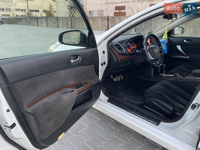 Белый Ниссан Теана, объемом двигателя 2.5 л и пробегом 260 тыс. км за 6000 $, фото 7 на Automoto.ua