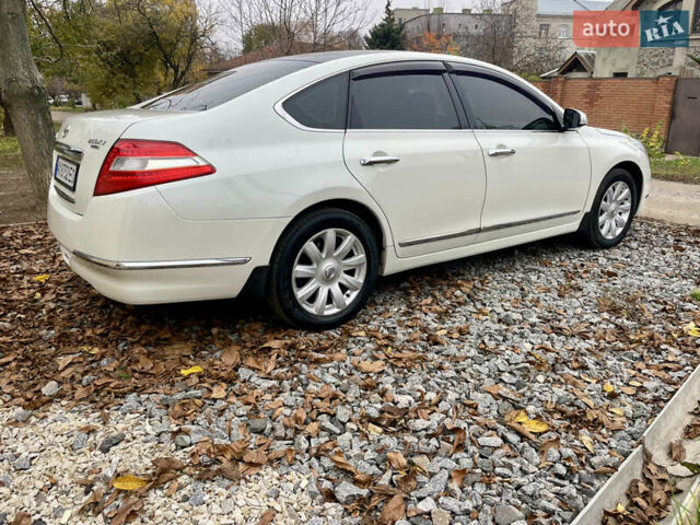 Белый Ниссан Теана, объемом двигателя 2.5 л и пробегом 240 тыс. км за 8499 $, фото 11 на Automoto.ua