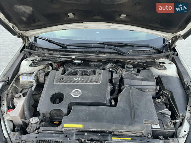 Білий Ніссан Теана, об'ємом двигуна 2.5 л та пробігом 259 тис. км за 6300 $, фото 15 на Automoto.ua