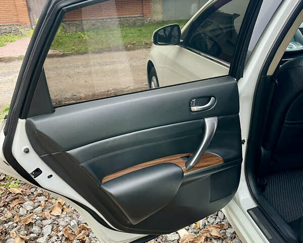 Белый Ниссан Теана, объемом двигателя 2.5 л и пробегом 240 тыс. км за 8499 $, фото 24 на Automoto.ua