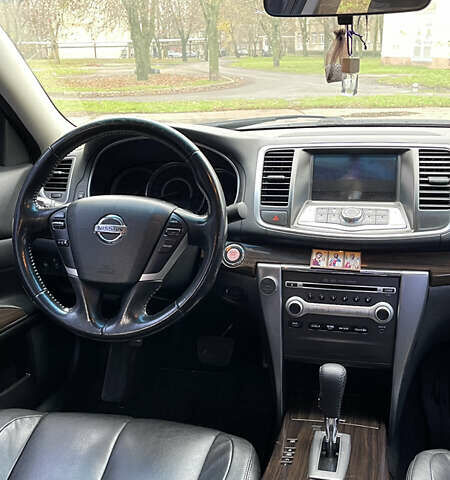 Белый Ниссан Теана, объемом двигателя 2.5 л и пробегом 239 тыс. км за 7700 $, фото 13 на Automoto.ua