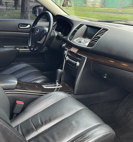 Белый Ниссан Теана, объемом двигателя 2.5 л и пробегом 239 тыс. км за 7700 $, фото 12 на Automoto.ua