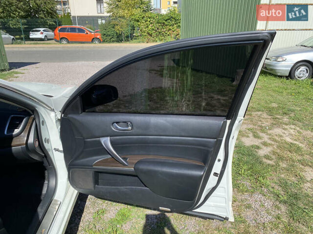 Белый Ниссан Теана, объемом двигателя 2.5 л и пробегом 244 тыс. км за 11300 $, фото 20 на Automoto.ua