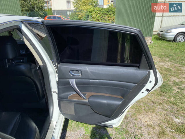 Белый Ниссан Теана, объемом двигателя 2.5 л и пробегом 244 тыс. км за 11300 $, фото 19 на Automoto.ua