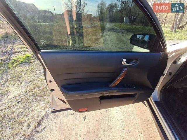 Бежевый Ниссан Теана, объемом двигателя 2 л и пробегом 295 тыс. км за 4500 $, фото 12 на Automoto.ua