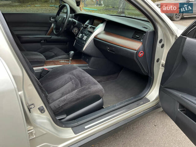 Бежевый Ниссан Теана, объемом двигателя 2.35 л и пробегом 155 тыс. км за 5700 $, фото 7 на Automoto.ua