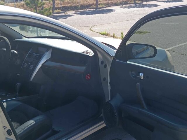 Бежевый Ниссан Теана, объемом двигателя 2.3 л и пробегом 300 тыс. км за 4300 $, фото 8 на Automoto.ua