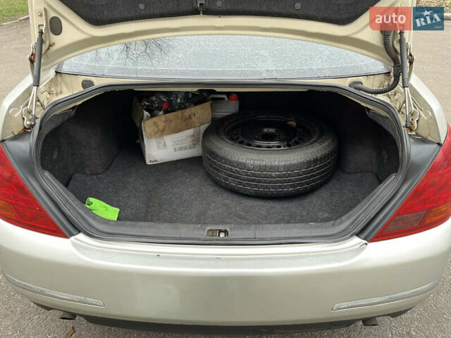 Бежевый Ниссан Теана, объемом двигателя 2.35 л и пробегом 155 тыс. км за 5700 $, фото 6 на Automoto.ua