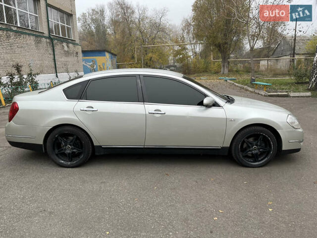 Бежевый Ниссан Теана, объемом двигателя 2.35 л и пробегом 155 тыс. км за 5700 $, фото 13 на Automoto.ua