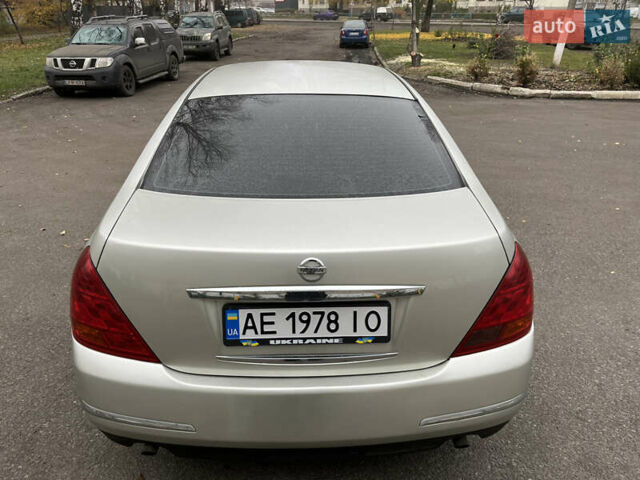 Бежевый Ниссан Теана, объемом двигателя 2.35 л и пробегом 155 тыс. км за 5700 $, фото 5 на Automoto.ua