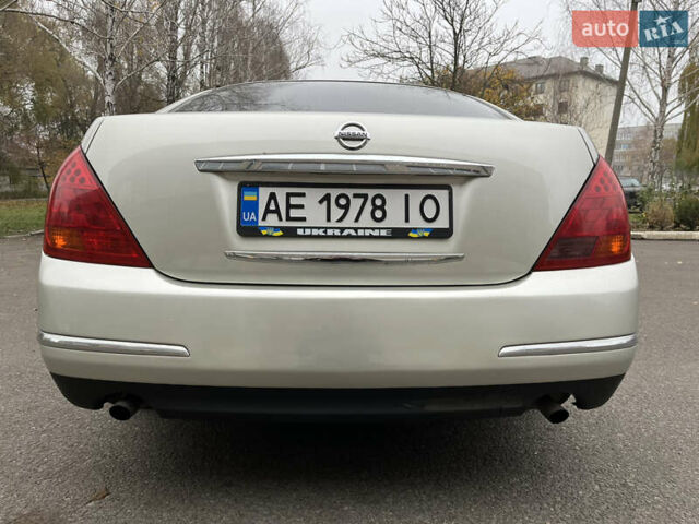 Бежевый Ниссан Теана, объемом двигателя 2.35 л и пробегом 155 тыс. км за 5700 $, фото 9 на Automoto.ua