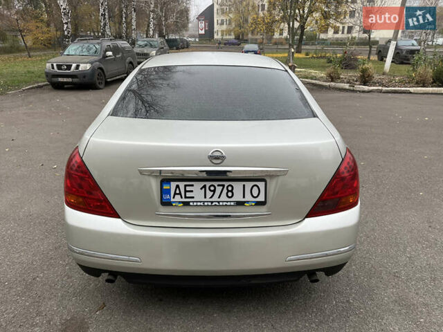 Бежевый Ниссан Теана, объемом двигателя 2.35 л и пробегом 155 тыс. км за 5700 $, фото 10 на Automoto.ua