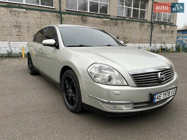 Бежевый Ниссан Теана, объемом двигателя 2.35 л и пробегом 155 тыс. км за 5700 $, фото 2 на Automoto.ua