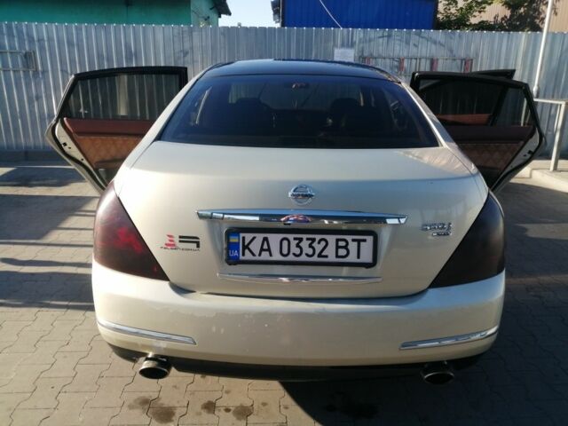 Бежевий Ніссан Теана, об'ємом двигуна 3.5 л та пробігом 240 тис. км за 4700 $, фото 6 на Automoto.ua