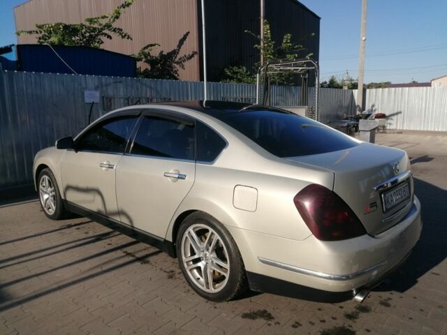 Бежевий Ніссан Теана, об'ємом двигуна 3.5 л та пробігом 240 тис. км за 4700 $, фото 5 на Automoto.ua