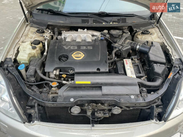 Бежевий Ніссан Теана, об'ємом двигуна 3.5 л та пробігом 208 тис. км за 6500 $, фото 11 на Automoto.ua